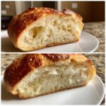 Close-up of a slice showing the airy, open crumb structure of the amazing Italian bread recipe.